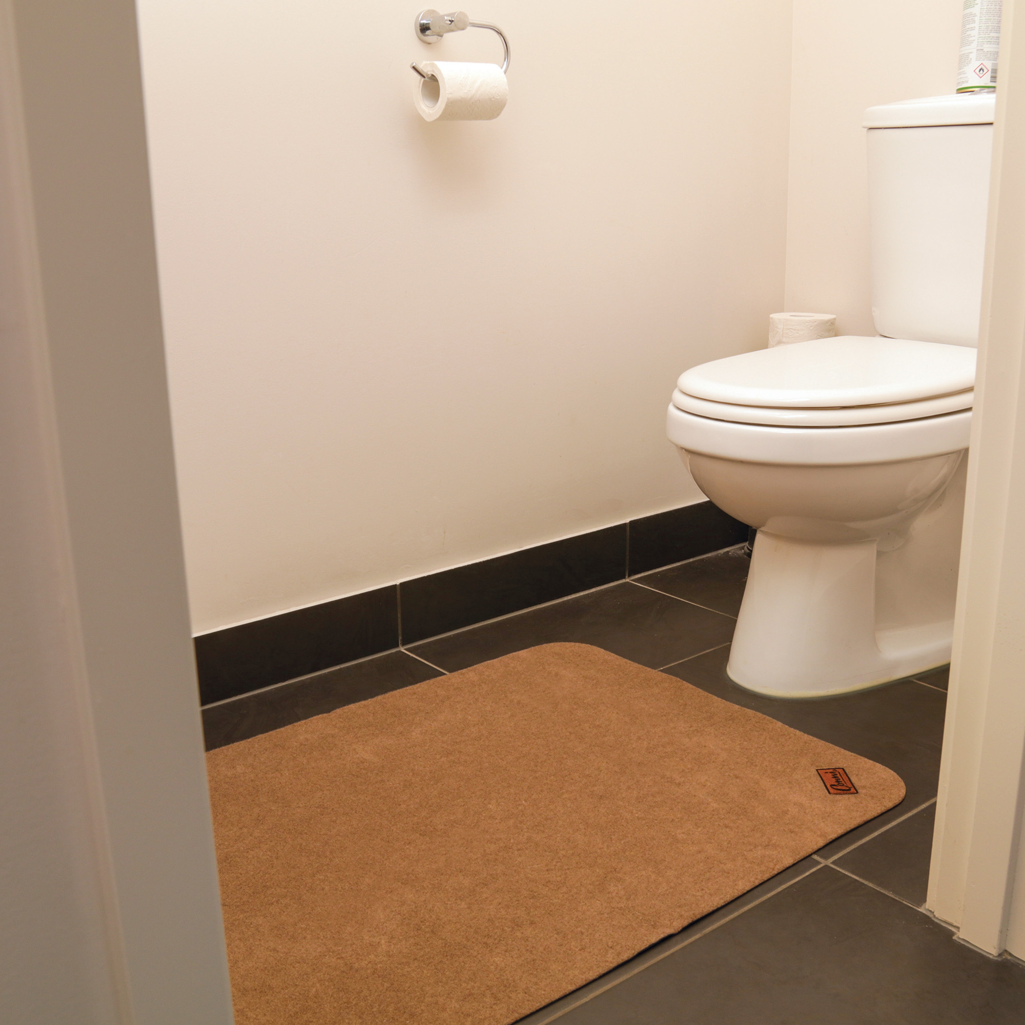 Conni Pebble Floor Mat by toilet